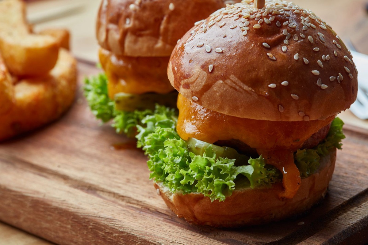 Cheeseburger slider on a wooden board